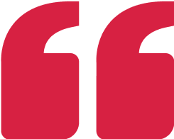 Red quotation marks on black background.
